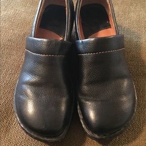 Born black leather wedges.